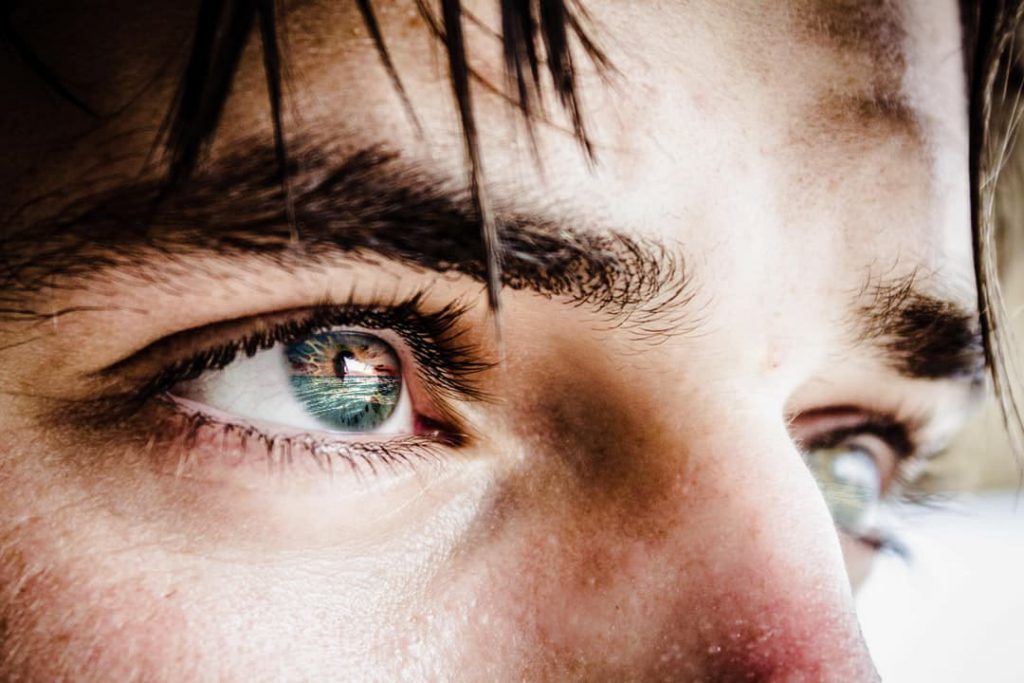 ocean waves in the man’s eyes