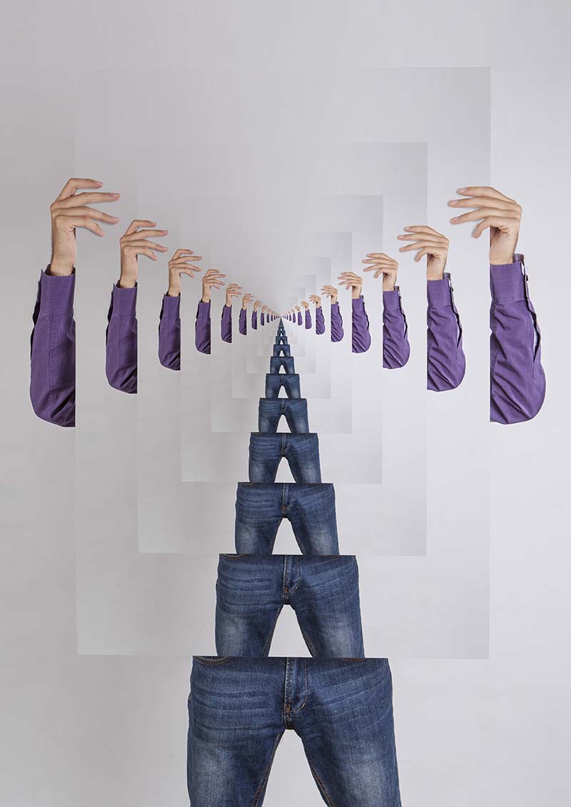 an optical illusion image of a man holding picture of himself to infinity
