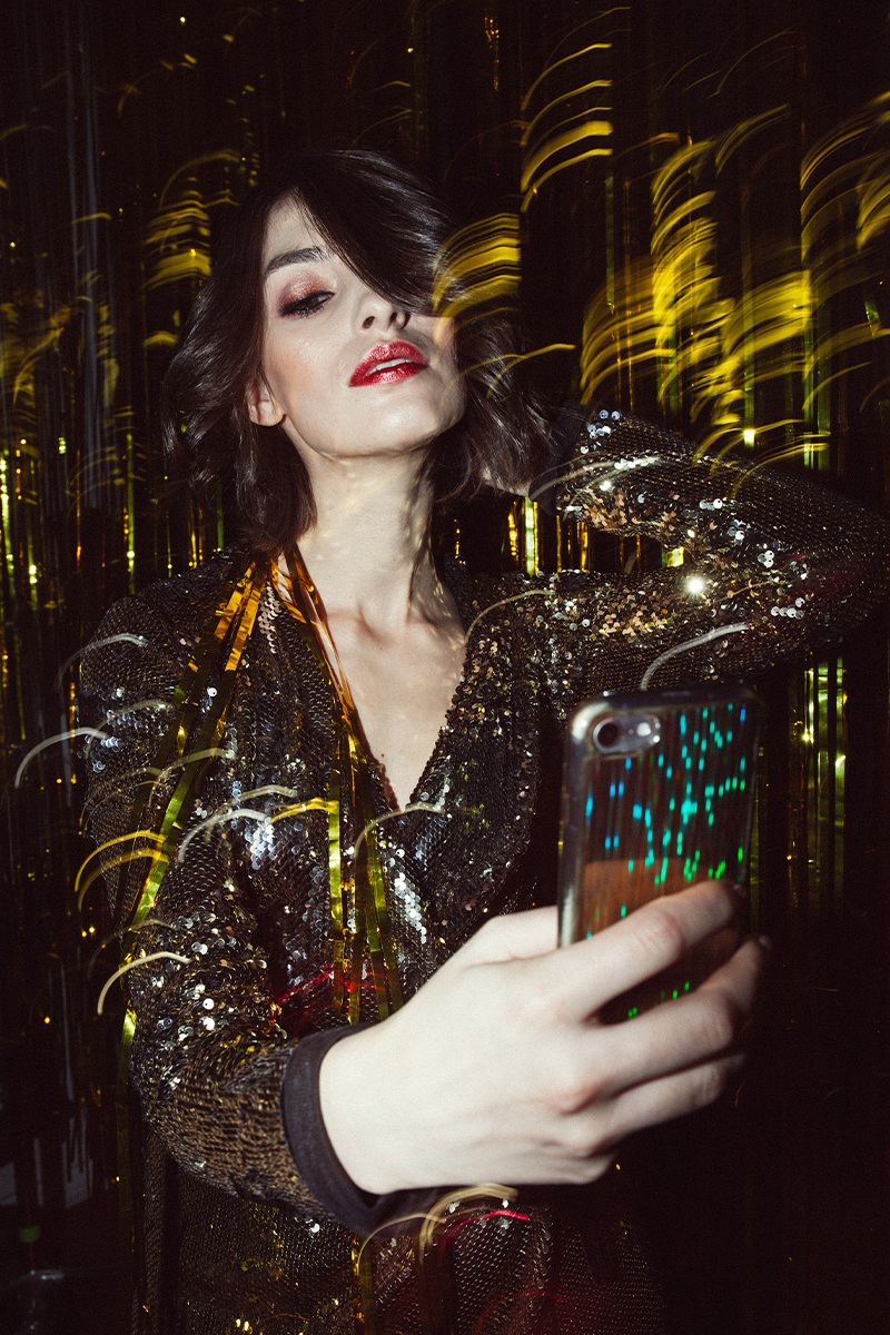 Woman uses light effects to take a unique photo